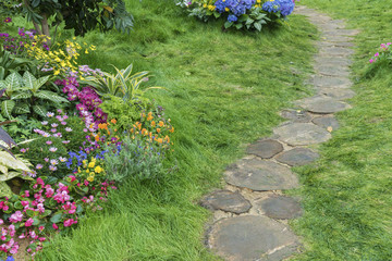 green path in flower garden