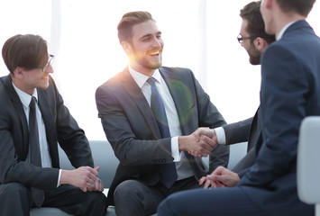 handshake business people in the office.