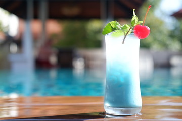 Blue Hawaiian classic cocktail at poolside bar
