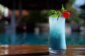 Blue Hawaiian classic cocktail at poolside bar