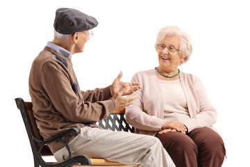 Elderly man and woman having a conversation