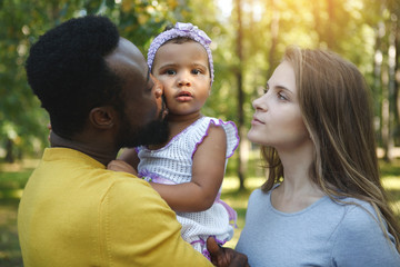 Portrait of Happy Smiling African American and white woman Family/