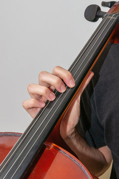 fingers on strings close up
