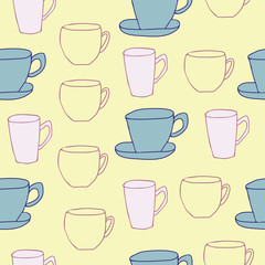 Teacups on yellow background