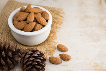 roasted almond in white cup, selective focus