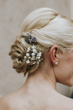 Close up of blond woman with elegant wedding hairstyle