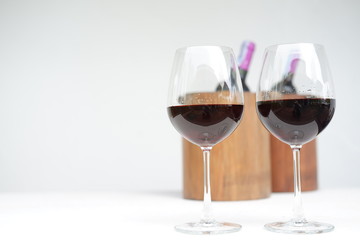 red wine glass and wine bottle, copy space