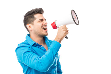 Bossy Man Shouting Into Megaphone Against White Background