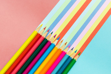 colored pencils and rainbow colorful stripes, stationary