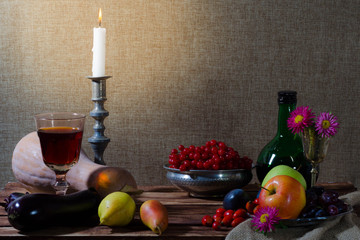 still life with pumpkin grapes dog rose green bottle grapes vibu