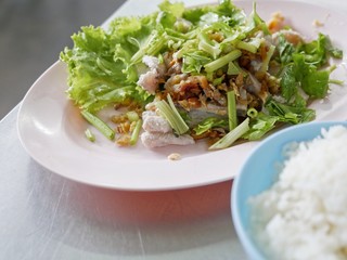 Boiled fish dip with sauce and vegetable, Boiled Sea Bass with rice - Thai food, ocean fish