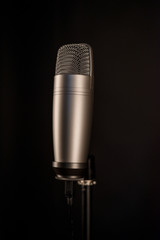 studio microphone on black background