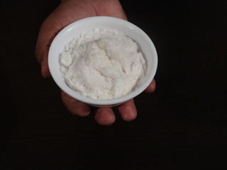 Salt on Wooden Background, Salt in White Bowl,Salt in White Bowl on Hand, sea salt in bowl on wooden background,White sea salt isolated on wooden background
