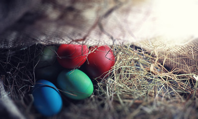 Easter painted eggs on burlap