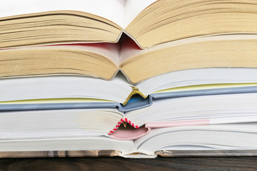 stack of hardcover books
