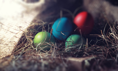 Easter painted eggs on burlap
