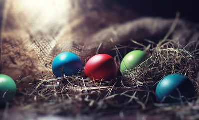 Easter painted eggs on burlap