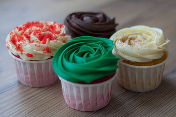 cupcakes with frosting and sprinkles