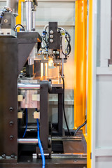 Manufacturing of bottles plastic line, bottle plastic hot blow process transportation raw material by automatic conveyor in the factory