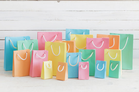 paper bags on wooden background