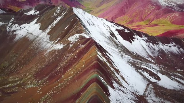 Aerial panoramic view of  colourful Vinicunca, Rainbow Mountain, Peru.