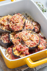 Gratin with grilled eggplant, tomato sauce and cheese