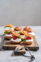 Raspberries Profiteroles with White Chocolate Cream