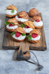 Raspberries Profiteroles with White Chocolate Cream
