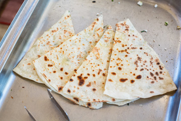 Pita bread with cottage cheese and greens