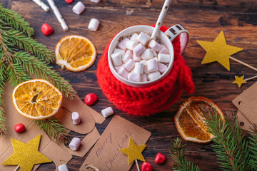 hot chocolate cacao with marshmallows knitted hand made red cloth for a mug christmas decoration