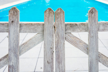 Wooden protection fence at the pool.