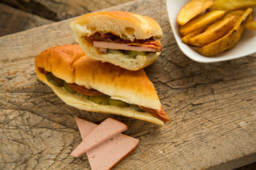 Sandwich with ham and french bun.