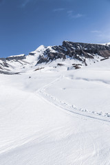 White melting snow on mountain and peak at Apls alpine in Switzerland , Europe