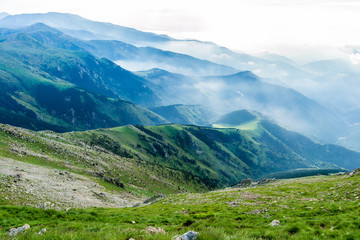 Fototapeta na wymiar Hiking in the mountains (Catalan Pyrenees, Peak of Costabona, Catalonia, Spain)