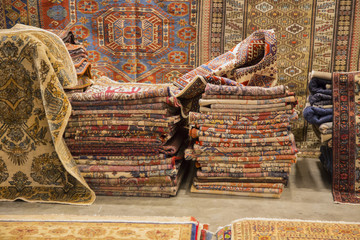 image of oriental carpets sold at a craft fair