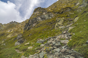 Landscape with rocky mountain peaks in summertime