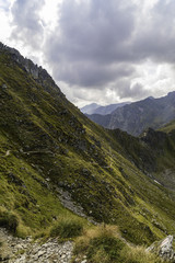 Fototapeta na wymiar Landscape with rocky mountain peaks in summertime
