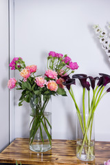 Colorful different flowers in vase at flower shop