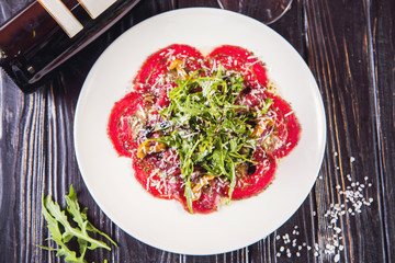 carpaccio with arugula