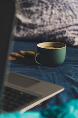Tea with Lemon and Cookies with Chocolate Laying on Mattress
