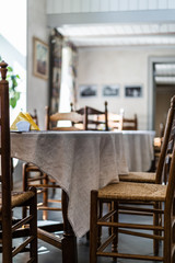 Empty Restaurant Table in Hotel with Yellow Napkins on it