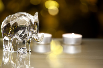 Glass Elephant figure Wax Gold bokeh reflection