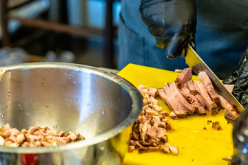 Cutted Ham on the Yello Cutting Board