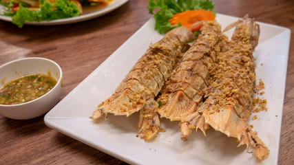Fried crayfish with garlic and pepper.