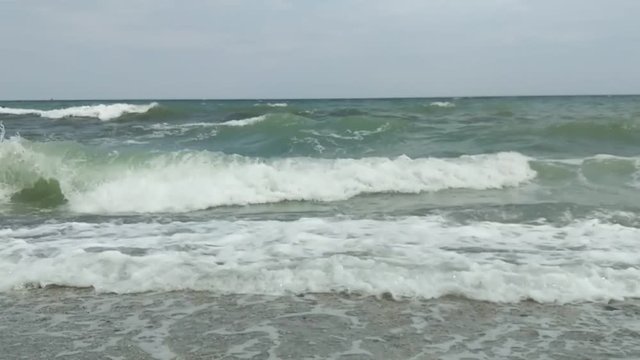 Waves on the sea in the autumn season