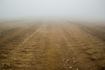 tire track on brown soil