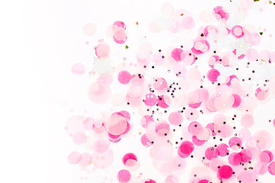 Background of pale pink paper confetti, holiday concept