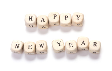 happy new year letters wooden blocks isolated on white