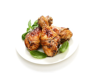 grilled chicken legs with sesame  in a  plate on a white background