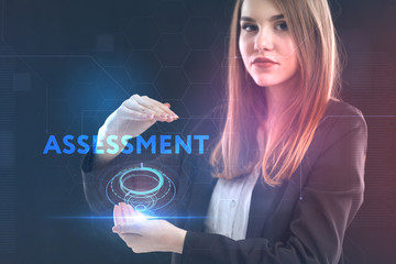 The concept of business, technology, the Internet and the network. A young entrepreneur working on a virtual screen of the future and sees the inscription: assessment